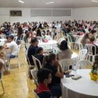 Áquila celebra 15 anos, homenageia jovens e voluntários em evento com as famílias